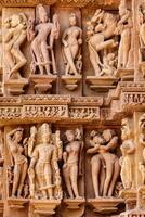 Famous sculptures of Khajuraho temples, India photo