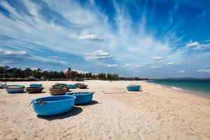 Fishing boats on beach. Mui Ne, Vietnam photo