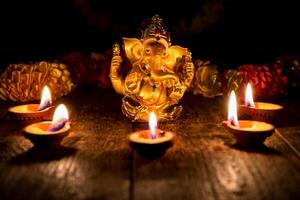 Ganesha with Diwali lights photo