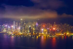 Aerial view of illuminated Hong Kong skyline. Hong Kong, China photo