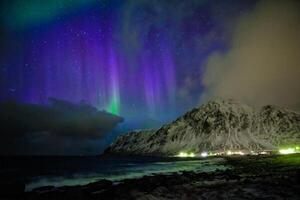 Aurora borealis northern lights. Lofoten islands, Norway photo