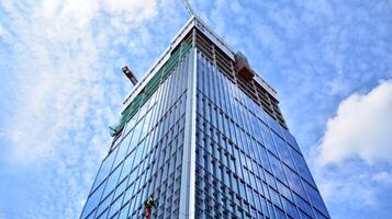 High-rise building under construction. Modern office building. photo