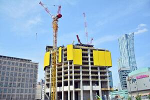 High-rise building under construction. Modern office building. photo