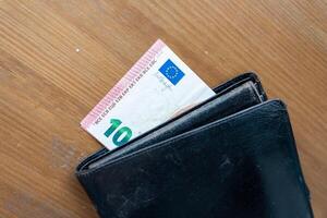 Black Wallet on Wooden Table photo