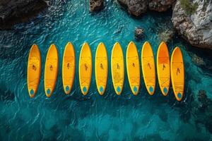 AI generated A set of yellow surfboards on a blue sea background photo