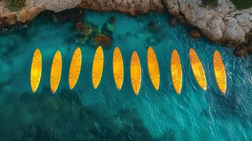AI generated A set of yellow surfboards on a blue sea background photo