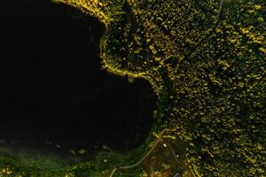 Top view of the lake Bolta in the forest in the Braslav lakes National Park, the most beautiful places in Belarus.An island in the lake.Belarus. photo