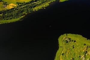Top view of lake Drivyaty in the Braslav lakes National Park, the most beautiful lakes in Belarus.An island in the lake.Belarus. photo