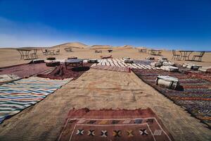 A panoramic sand dune near the desert camp at Mhamid el Ghizlane in Morocco photo