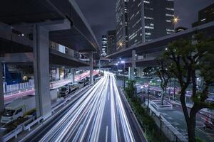 A night traffic jam at the urban street in Tokyo wide shot photo