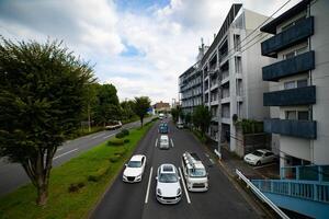 A traffic jam at the urban street in Tokyo wide shot photo