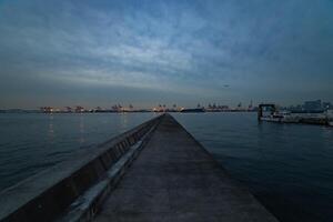 A dusk cityscape near the container port in Tokyo wide shot photo