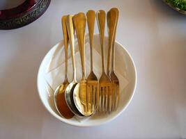 Plate and fork set Placed on the dining table, it looks elegant photo