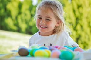 Happy Baby Coloring Easter Eggs photo