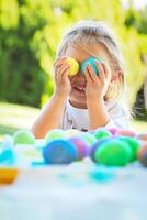 Happy Baby Coloring Easter Eggs photo