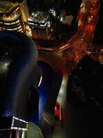 Aerial Night View of Illuminated City Centre Buildings of Birmingham Central City of England United Kingdom. March 30th, 2024 photo