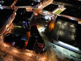 aéreo noche ver de iluminado ciudad centrar edificios de Birmingham central ciudad de Inglaterra unido Reino. marzo 30, 2024 foto