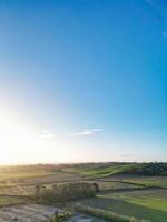 Aerial View of British Countryside Landscape Near Oxford City, Oxfordshire, England UK During Sunrise Morning. March 23rd, 2024 photo