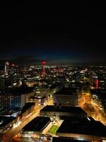 Aerial Night View of Illuminated City Centre Buildings of Birmingham Central City of England United Kingdom. March 30th, 2024 photo