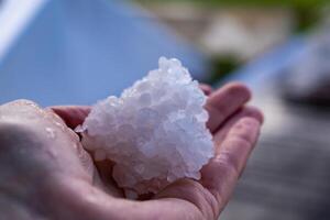 Hail balls in march, natural springtime weather, can cause damages photo