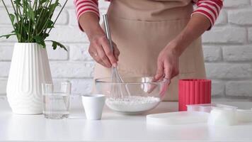 young woman making gypsum artisanal items video