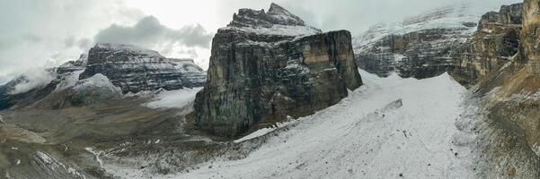 Panoramic Aerial view of snow-capped Mount Lefroy on a fall day photo