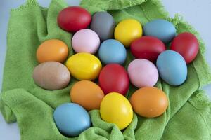 eggs painted in different colors to celebrate Easte photo