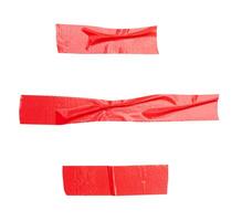 Top view set of wrinkled red adhesive vinyl tape or cloth tape in stripes shape isolated on white background with clipping path photo