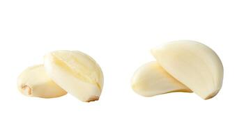 Front view set of fresh pounded garlic cloves in stack isolated on white background with clipping path photo