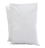 Front view of white pillow with case after guest use in resort or hotel room isolated on white background with clipping path photo