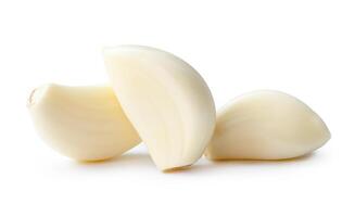 Front view of garlic cloves or slices in stack isolated on white background with clipping path photo