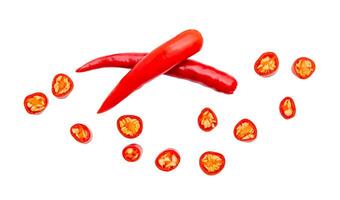 Top view set of red chili pepper or cayenne pepper with slices or pieces isolated on white background with clipping path photo