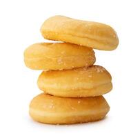 Side view of sugar glazed cinnamon donuts in stack isolated on white background with clipping path photo