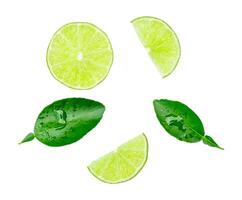 Top view set of green lemon fruit in half and slice or quarter shape with leaves isolated on white background with clipping path photo