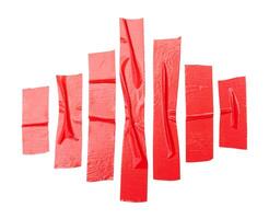 Top view set of wrinkled red adhesive vinyl tape or cloth tape in stripes shape isolated on white background with clipping path photo