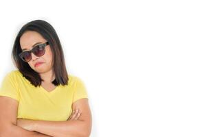 Close up shot of stylish woman in sunglasses smiling on white background. photo