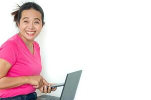 woman using laptop on white background photo