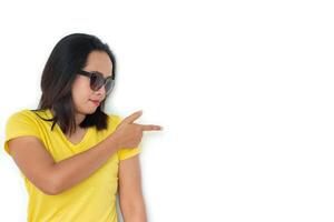 Close up shot of stylish woman in sunglasses smiling on white background. photo