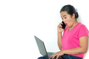 woman using laptop on white background photo