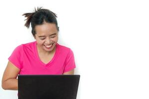 woman using laptop on white background photo