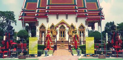 Bangkok, Thailand - March 3, 2024 Statue of Thao Wessuwan for worship and faith in sacredness with ancient church in Thai temples. Religion, Landmark for travel and Exterior design in Asia style. photo