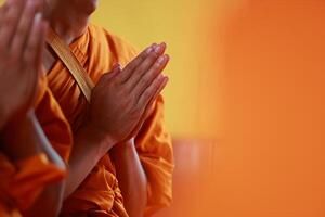 Monks are performing Buddhist rituals to pray for the souls of the deceased to go to heaven and find happiness after death. The concept of Buddhist rituals to pray for the spirits of the deceased. photo