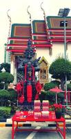 Bangkok, Thailand - March 3, 2024 Statue of Thao Wessuwan for worship and faith in sacredness with ancient church in Thai temples. Religion, Landmark for travel and Exterior design in Asia style. photo