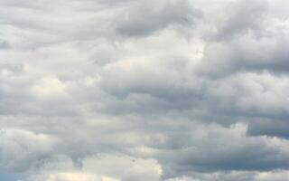 photo of cloudy clouds before rain