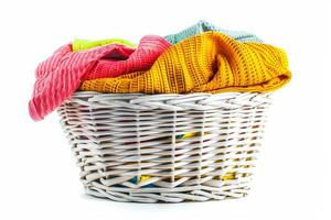 AI generated Overflowing Laundry Basket of Clothes Isolated on White Background photo