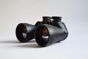 AI generated Compact Black Binoculars Isolated on White Background photo