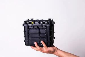 AI generated Person Holding Battery Isolated on White Background photo