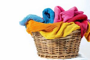 AI generated Colorful Laundry Basket of Clothes Isolated on White Background photo