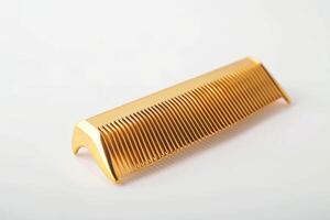 AI generated Luxurious Golden Comb Isolated on White Background photo