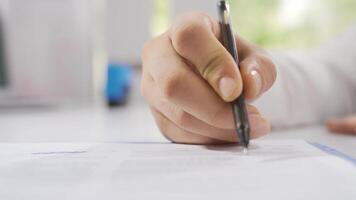 Close-up Businessman signing paperwork, making a contract. video